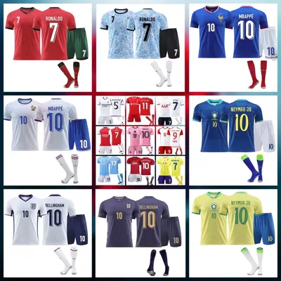 Nine football kits with printed squad numbers arranged in a grid on white